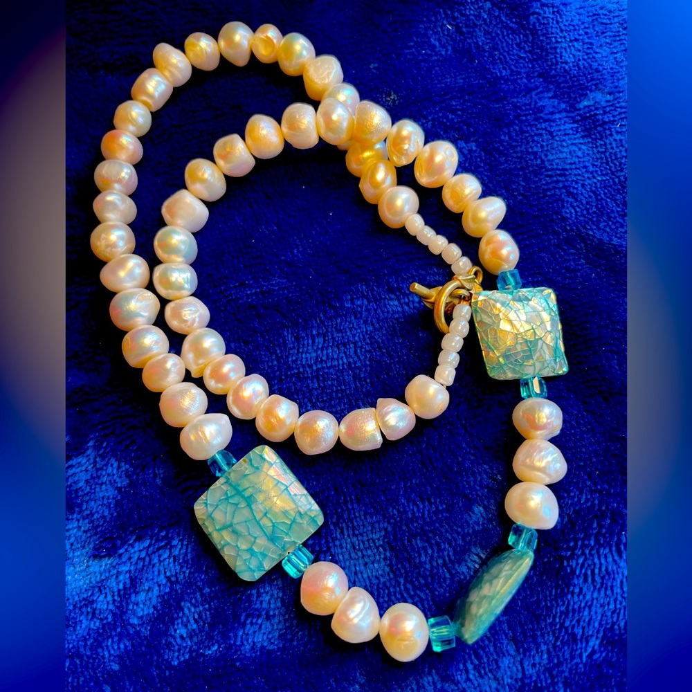 Cultured fresh water baroque pearls necklace & stretch abalone bracelet.